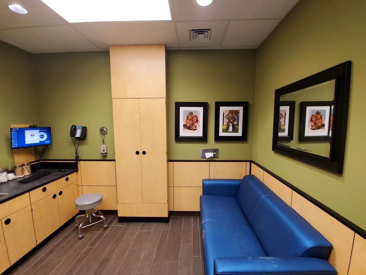 A view of the Carmichael Banfield hospital exam room and couch